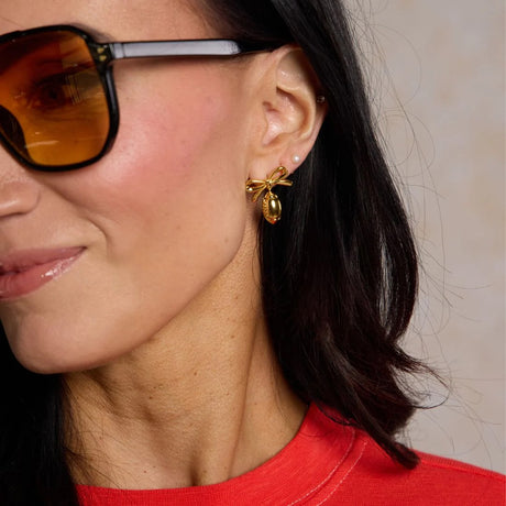 Nickel & Suede Waterproof Football Bow Stud Earrings